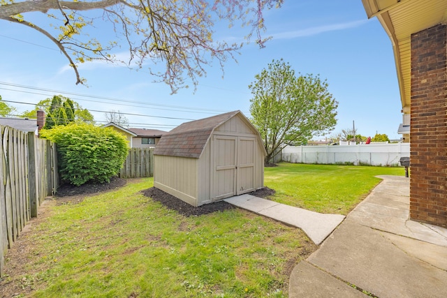 13488 Kingsville Dr, Sterling Heights, MI 48312 - view of yard featuring a storage unit and an outdoor structure