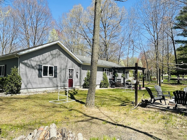 9612 Clubhouse Dr W, Canadian Lakes, MI 49346 - view of front of property with a front lawn