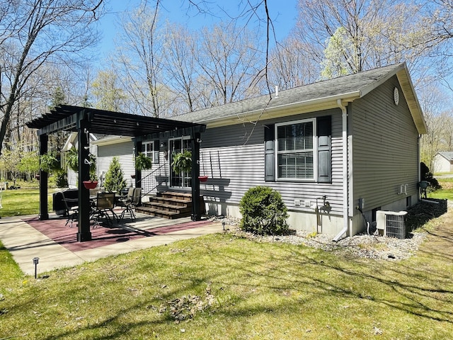 9612 Clubhouse Dr W, Canadian Lakes, MI 49346 - back of property with a pergola, central AC unit, a yard, and a patio area