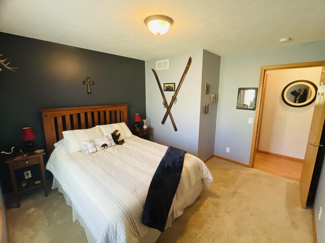 9612 Clubhouse Dr W, Canadian Lakes, MI 49346 - bedroom featuring light carpet and baseboards