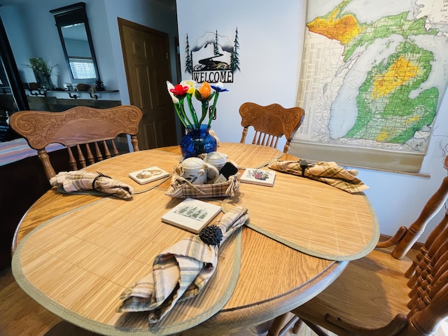 9612 Clubhouse Dr W, Canadian Lakes, MI 49346 - dining room featuring wood finished floors