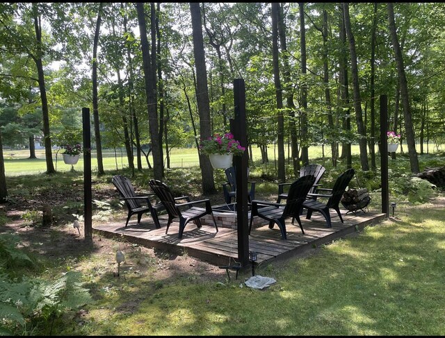 9612 Clubhouse Dr W, Canadian Lakes, MI 49346 - view of patio / terrace featuring a wooden deck