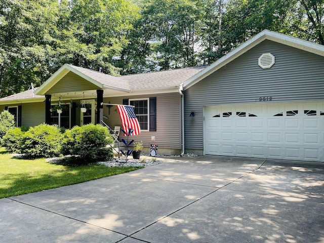 9612 Clubhouse Dr W, Canadian Lakes, MI 49346 - ranch-style home with a garage, concrete driveway, and a shingled roof