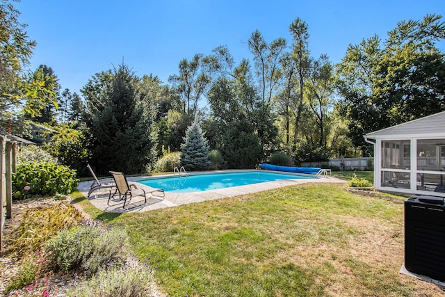 2021 Skyler Dr, Kalamazoo, MI 49008 - view of pool featuring a sunroom, a covered pool, and a patio area