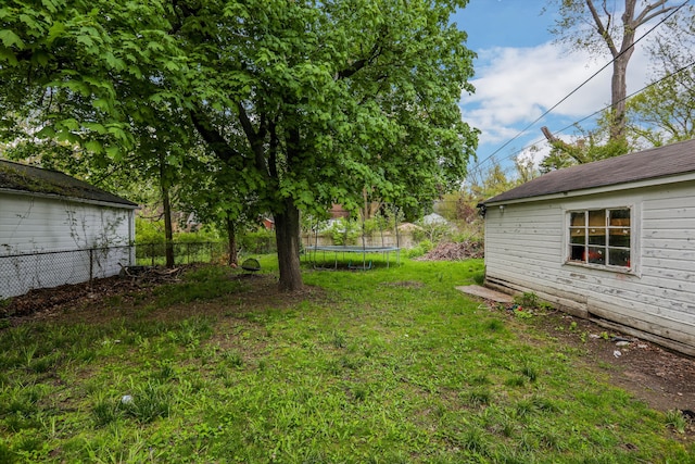 view of yard featuring a trampoline