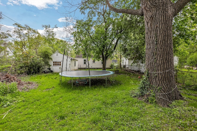 view of yard featuring a trampoline