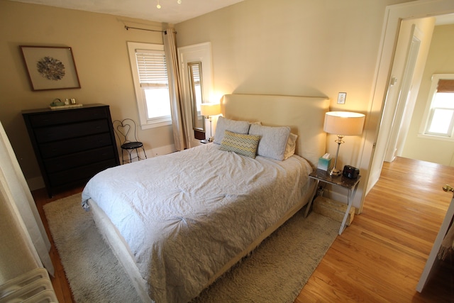 2414 Yale Ave, Royal Oak, MI 48067 - bedroom featuring wood finished floors and multiple windows