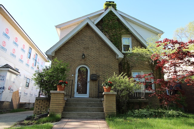 2414 Yale Ave, Royal Oak, MI 48067 - tudor home featuring brick siding and a chimney