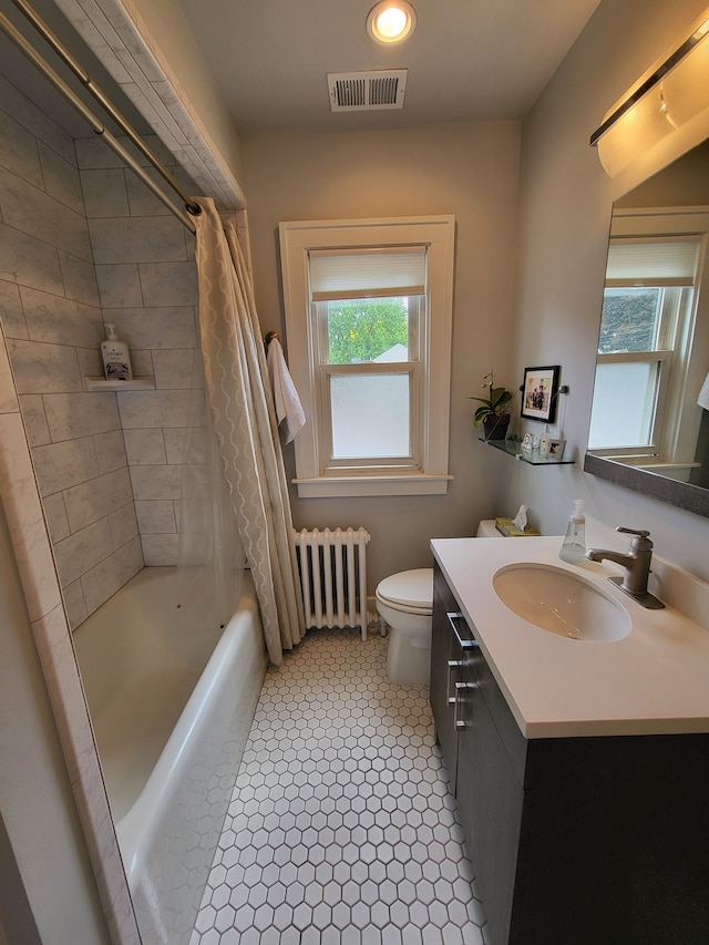 2414 Yale Ave, Royal Oak, MI 48067 - full bathroom with radiator heating unit, healthy amount of natural light, vanity, and shower / bathtub combination with curtain