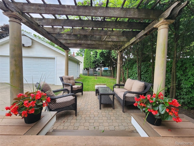 2414 Yale Ave, Royal Oak, MI 48067 - view of patio with an outdoor living space, a garage, and an outbuilding