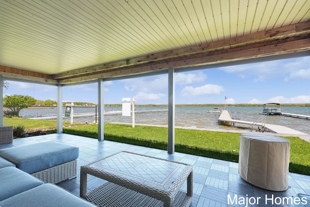 sunroom with a water view
