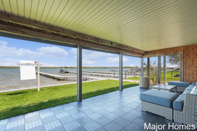 view of patio featuring a water view