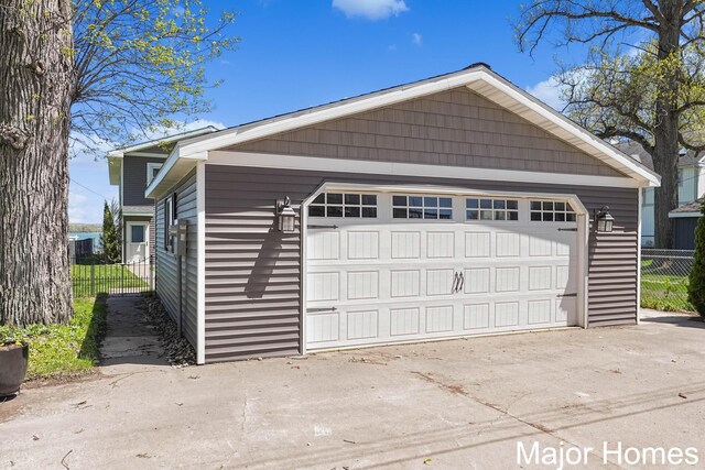 detached garage with fence