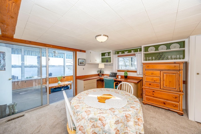 10401 N Chippewa Dr, Evart, MI 49631 - dining space with light carpet
