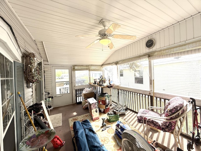 sunroom featuring ceiling fan