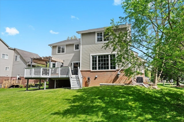 3645 Sandbar Dr, Commerce Twp, MI 48382 - back of property with stairs, a wooden deck, a pergola, a lawn, and brick siding