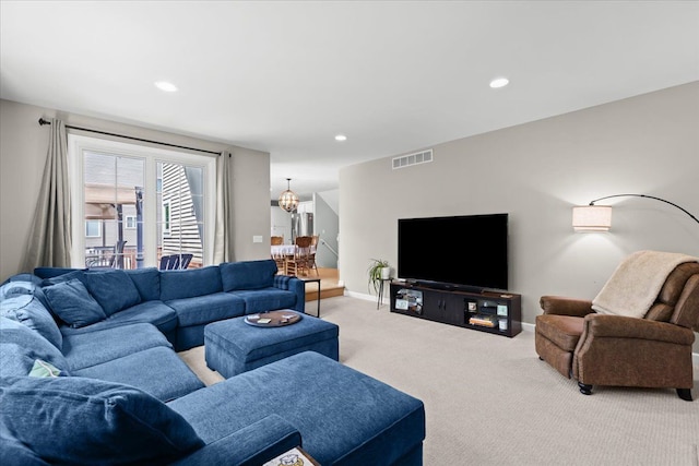 3645 Sandbar Dr, Commerce Twp, MI 48382 - living room with light colored carpet, recessed lighting, baseboards, and a chandelier