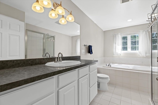 3645 Sandbar Dr, Commerce Twp, MI 48382 - bathroom with tile patterned flooring, vanity, a bath, a shower stall, and toilet