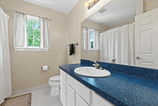 3645 Sandbar Dr, Commerce Twp, MI 48382 - full bath featuring healthy amount of natural light, tile patterned floors, toilet, and baseboards