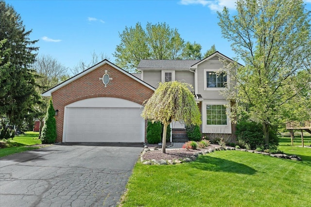 3645 Sandbar Dr, Commerce Twp, MI 48382 - traditional-style home featuring brick siding, a front yard, a garage, and asphalt driveway