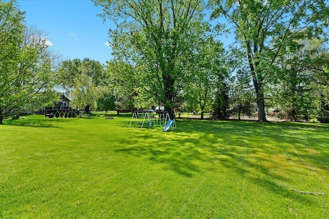 3645 Sandbar Dr, Commerce Twp, MI 48382 - view of grassy yard with a playground