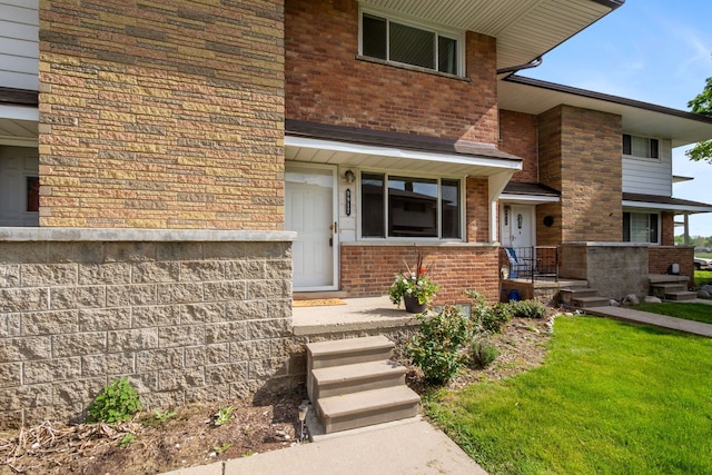 9917 Middlebelt Rd, Livonia, MI 48150 - property entrance with brick siding and a yard
