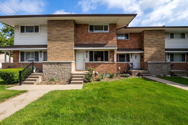 9917 Middlebelt Rd, Livonia, MI 48150 - view of front of home featuring brick siding and a front lawn