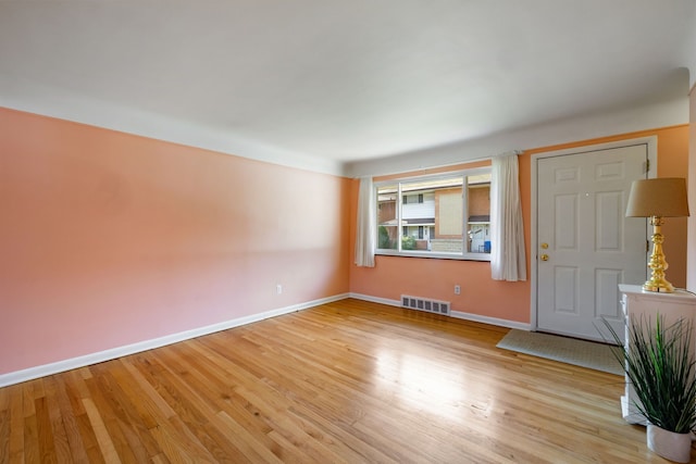 9917 Middlebelt Rd, Livonia, MI 48150 - empty room featuring light wood-style floors and baseboards