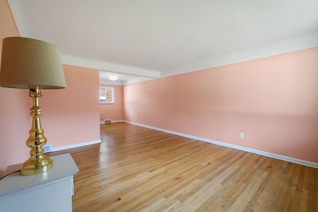 9917 Middlebelt Rd, Livonia, MI 48150 - spare room featuring light wood finished floors and baseboards