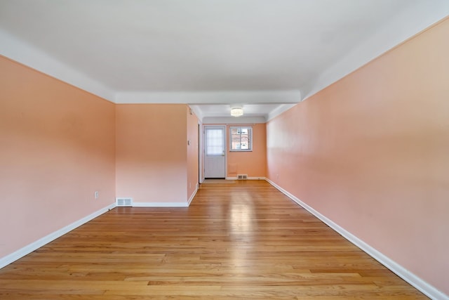 9917 Middlebelt Rd, Livonia, MI 48150 - unfurnished room with light wood-type flooring and baseboards