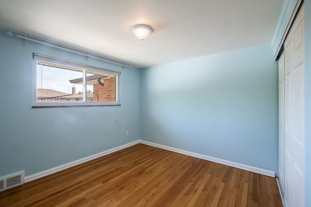 9917 Middlebelt Rd, Livonia, MI 48150 - spare room with baseboards and wood finished floors
