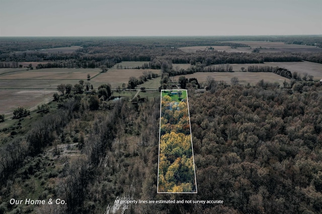 aerial view of sparsely populated area featuring property parcel outlined