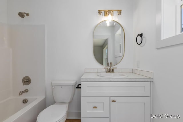 full bathroom with shower / bath combination, toilet, and vanity