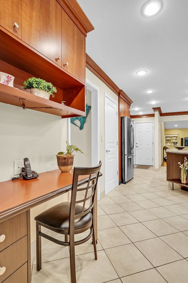 kitchen featuring freestanding refrigerator, open shelves, light tile patterned floors, recessed lighting, and brown cabinets