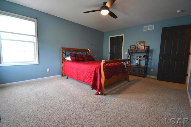 1872 Allan St, Adrian, MI 49221 - bedroom featuring carpet floors, baseboards, and a ceiling fan