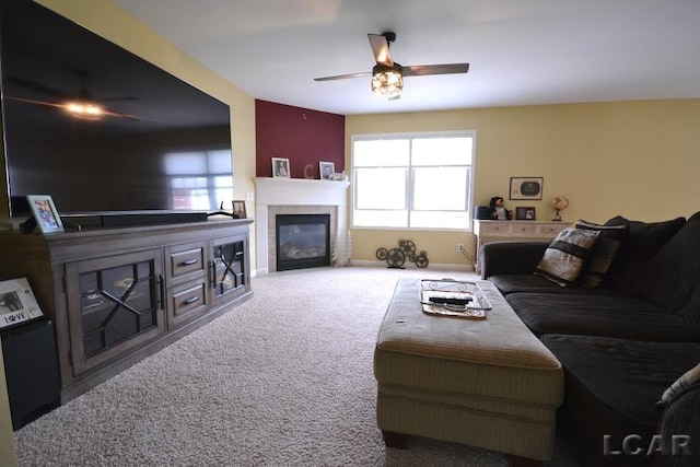 1872 Allan St, Adrian, MI 49221 - carpeted living room featuring a ceiling fan, a tiled fireplace, and baseboards