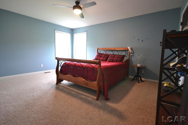 1872 Allan St, Adrian, MI 49221 - bedroom with carpet flooring, baseboards, and a ceiling fan