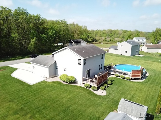 1872 Allan St, Adrian, MI 49221 - back of property featuring a lawn and a deck