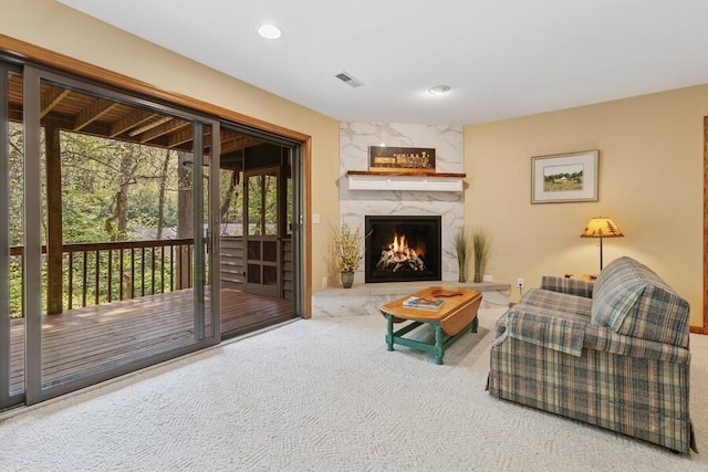 10059 Weko Dr, Bridgman, MI 49106 - living room featuring carpet flooring, a premium fireplace, and recessed lighting