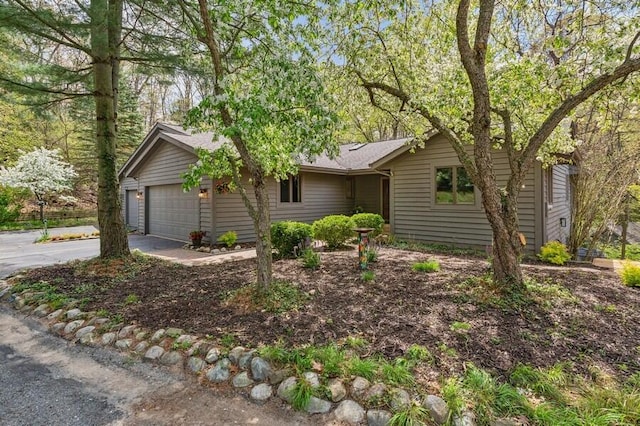 10059 Weko Dr, Bridgman, MI 49106 - ranch-style house with driveway and a garage
