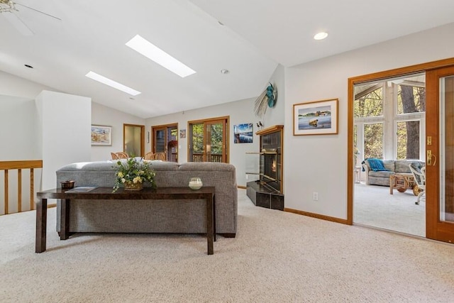 10059 Weko Dr, Bridgman, MI 49106 - carpeted living room featuring lofted ceiling, recessed lighting, baseboards, and a skylight