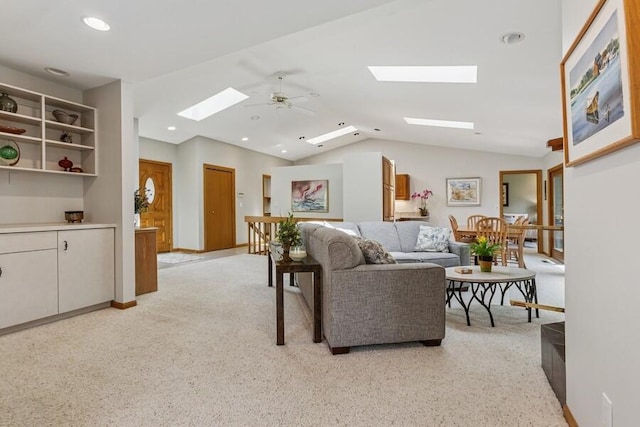 10059 Weko Dr, Bridgman, MI 49106 - living room featuring a skylight, vaulted ceiling, light carpet, a ceiling fan, and recessed lighting