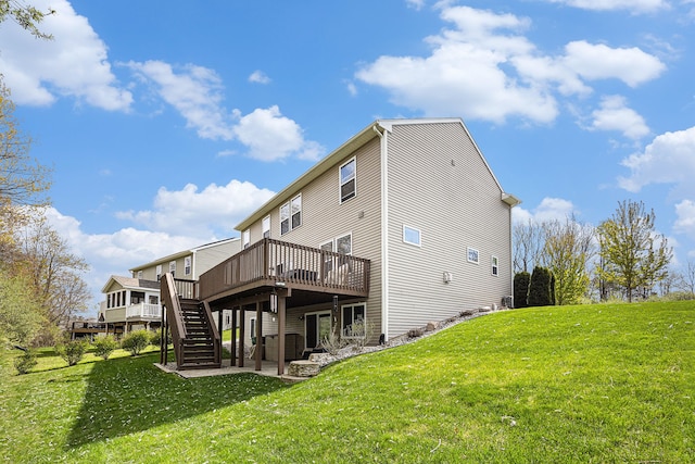 754 Autumn Valley Dr, Ortonville, MI 48462 - rear view of property with a wooden deck, stairs, and a yard