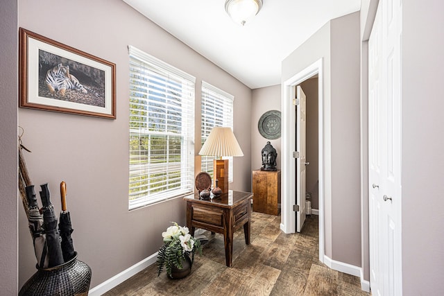 754 Autumn Valley Dr, Ortonville, MI 48462 - hallway featuring wood finished floors and baseboards