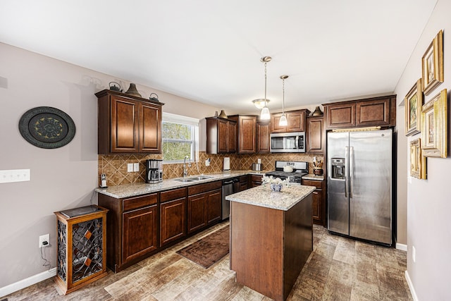 754 Autumn Valley Dr, Ortonville, MI 48462 - kitchen with appliances with stainless steel finishes, a sink, backsplash, and light wood-style flooring