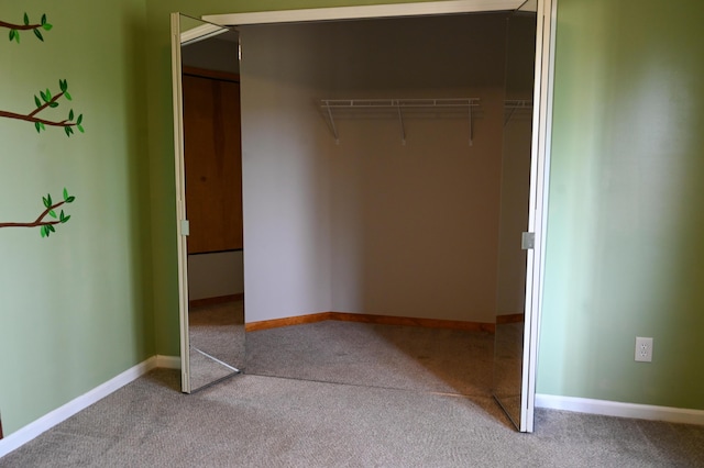 45762 Prairiegrass Ct Unit 7, Michigan, MI 48111 - unfurnished bedroom with carpet floors, a closet, and baseboards