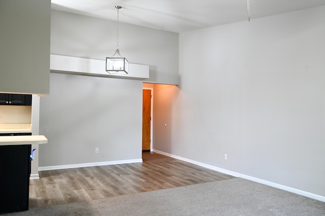 45762 Prairiegrass Ct Unit 7, Michigan, MI 48111 - unfurnished dining area featuring baseboards and wood finished floors