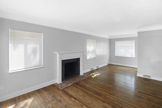 14643 Penrod St, Detroit, MI 48223 - unfurnished living room featuring a fireplace, wood finished floors, and baseboards