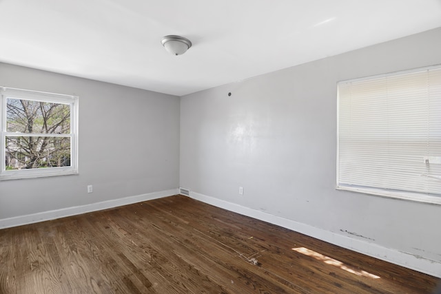 14643 Penrod St, Detroit, MI 48223 - spare room with dark wood-style flooring and baseboards