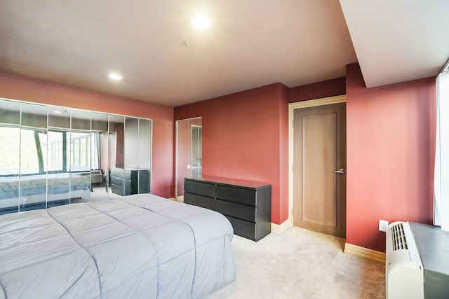 300 Riverfront Dr Unit 300/4C, Detroit, MI 48226 - bedroom featuring baseboards, light colored carpet, and recessed lighting